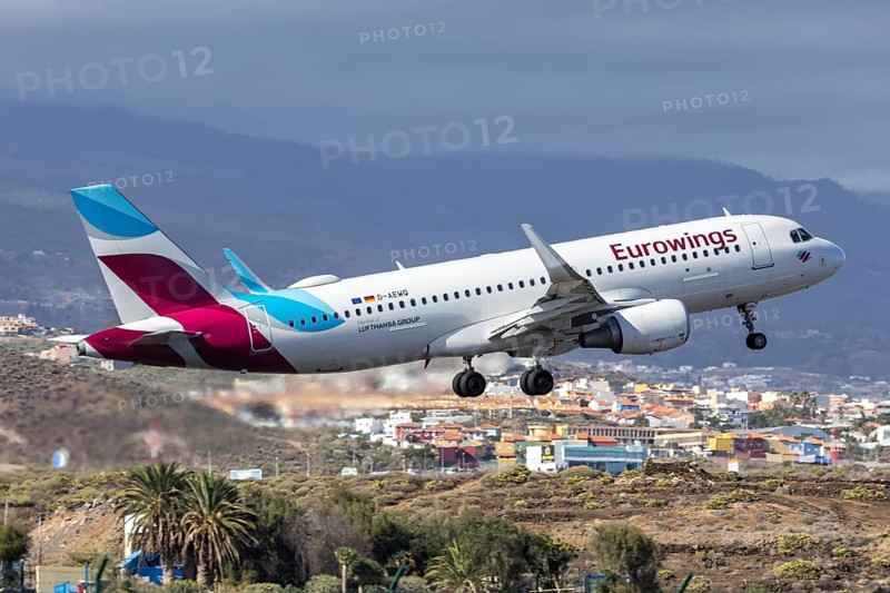 A Eurowings Airbus A320 aircraft with the D-AEWQ license plate at Tenerife Airport, Spain