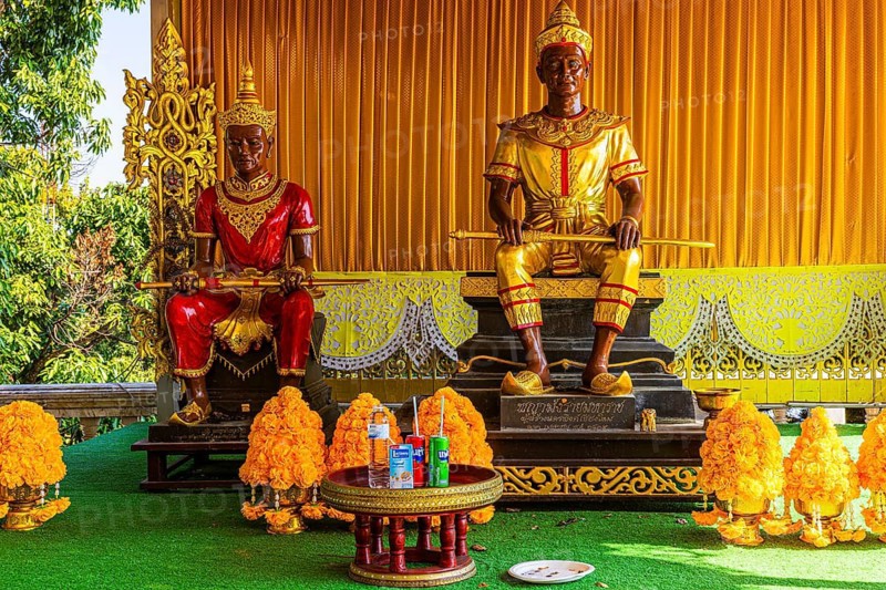 Two temple guards armed with swords sitting on a pedestal, Wat Phra That Doi Suthep temple complex, Chiang Mai, Thailand