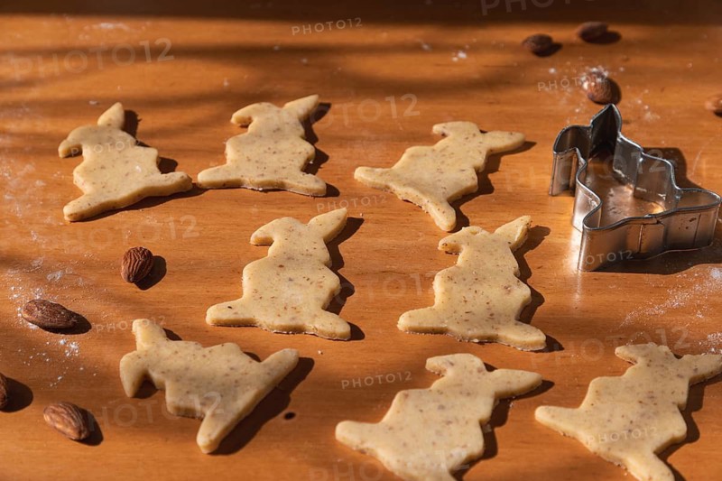 Cut out cookies in the shape of Easter bunnies
