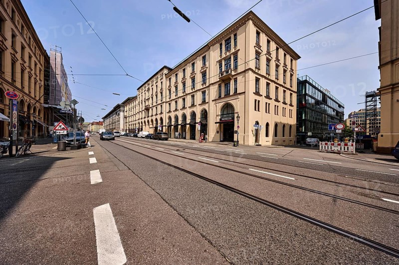Luxury shops, general architecture, historic residential and commercial buildings, street, center line, tram tracks, overhead lines, parking strips with cars, pale blue sky, cumulus clouds, cirrostratus clouds, slightly diffused and sunny light, intersection of Maximilianstraße, Am Kosttor and Marstallstraße, Munich, state capital, district-free city, Bavaria, Germany