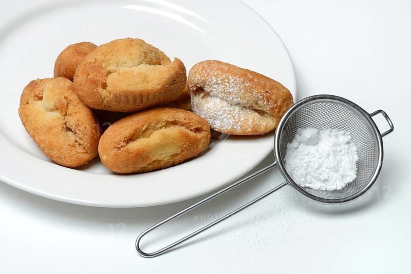 Schenkeli on a plate, sweet pastry for carnival time, Switzerland