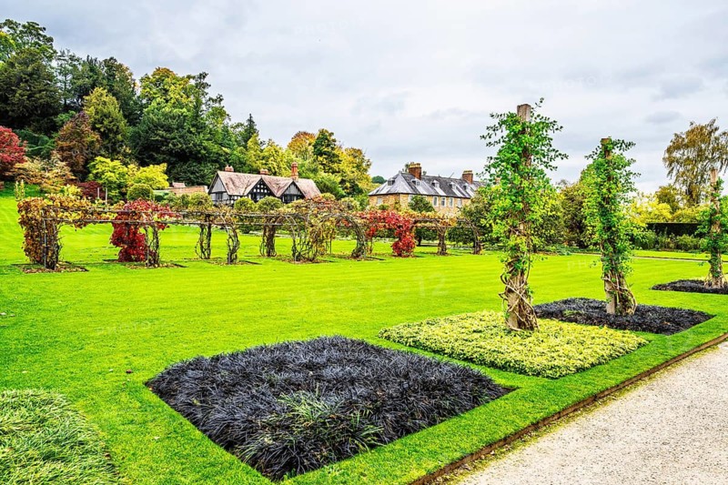 Autumn colors over Powis Castle and Garden, Welshpool, Powys, Wales, UK