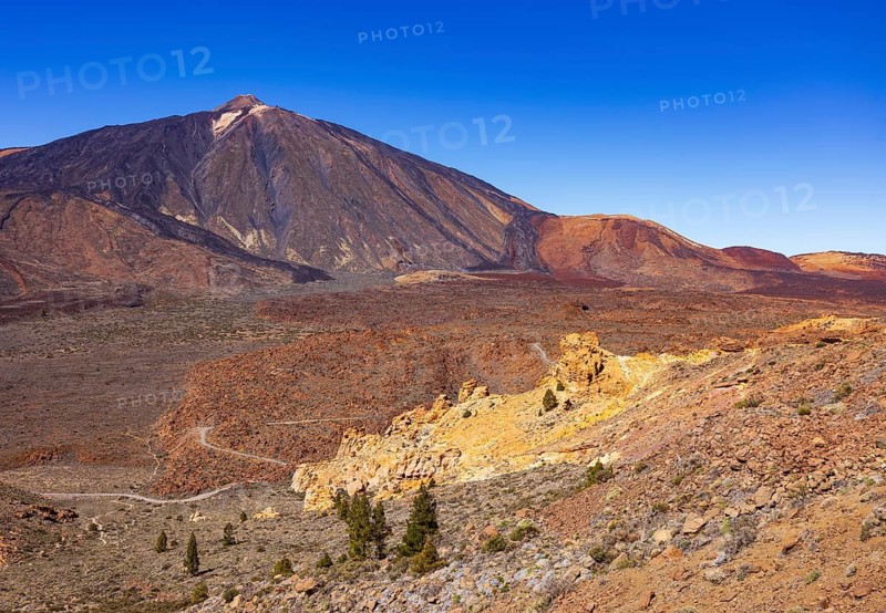 Mountain hiking on Montana Guajara, Canada del Capricho rock formation with view to Mount Teide, Teide National Park, Tenerife, Canary Islands, Spain