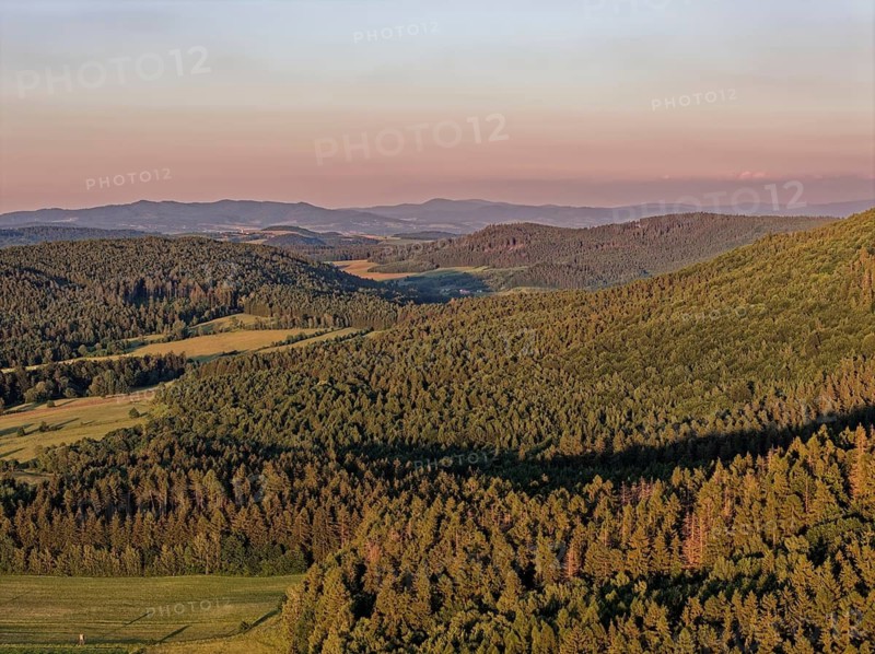 Foothills of the Heuscheuer Mountains. The Heuscheuergebirge National Park, Park Narodowy Gopr Stolowych, is located in the Central Sudetes, Lower Silesia, in southwestern Poland. aerial view. Radkow, Szczytna, Silesia, Poland