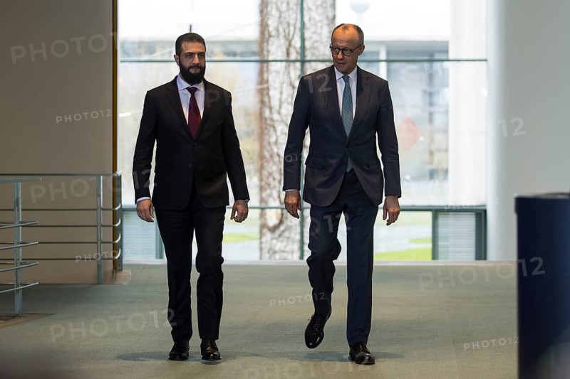 Ahmed al-Sharaa (President of the Syrian Arab Republic) and Friedrich Merz (Chancellor of the Federal Republic of Germany, CDU) on their way to the press conference after a one-on-one meeting at the Federal Chancellery, Berlin, 30 March 2026