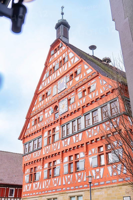 Half-timbered building with striking tower and clock, eye-catching traditional architecture, town hall, Großbottwar, Ludwigsburg district, Baden-Württemberg, Germany