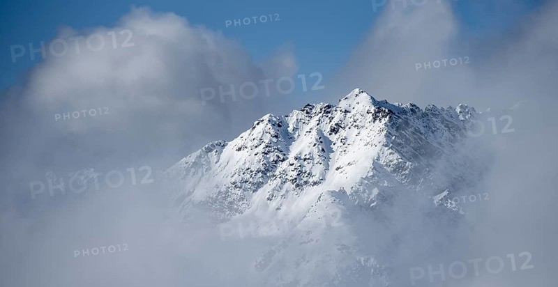 Snow-covered Alps, winter landscape in the mountains, Albula Alps, Grisons, Switzerland