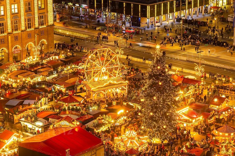 Dresden's Striezel Market has been held mostly on the Altmarkt since 1434 during Advent and attracts an average of around two million visitors a year. It is the oldest Christmas market in Germany, confirmed by a certificate. View from Kreuzkirche tower, Dresden, Saxony, Germany