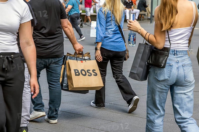 Shopping in Outletcity Metzingen. The 500 premium and luxury brands focus on clothing, but also offer beauty and home products. Outletcity AG around Hugo Boss is the first and one of the largest outlet locations in Germany. Metzingen, Baden-Württemberg, Germany