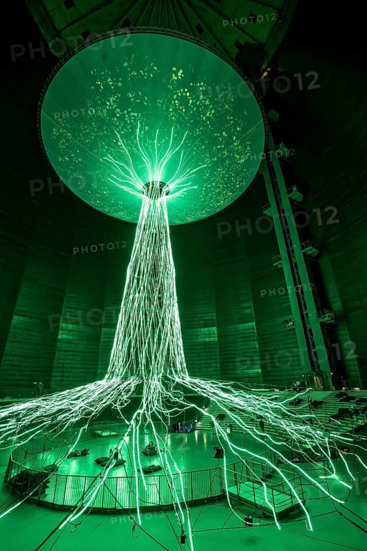 New exhibition at Gasometer Oberhausen, art sculpture The Tree, 40 meter high light installation, shows different stages of a tree with light and music, exhibition Myth Forest, on 3 levels and with several thematic chapters, the exhibition shows the diversity of the world's forests with pictures, videos and exhibits, North Rhine-Westphalia, Germany