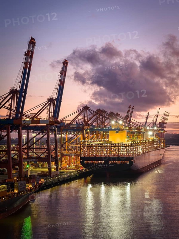 Aerial view at Waltershof harbour during the Blue Hour at the berths of Eurogate Container Terminal Hamburg (CTH) with the Manila Express (Hapag-Lloyd), Hamburg, Germany