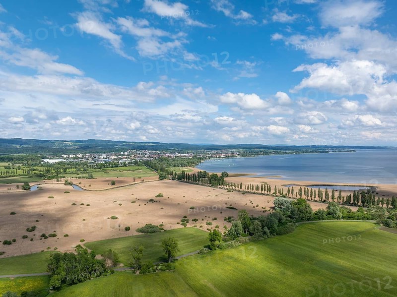 Aerial view of Mooser Damm with state road L192 which crosses Radolfzeller Aachried on the shore zone of western Lake Constance and connects the town of Radolfzell with the village of moss and the Mettnau peninsula, Konstanz district, Baden-Württemberg, Germany