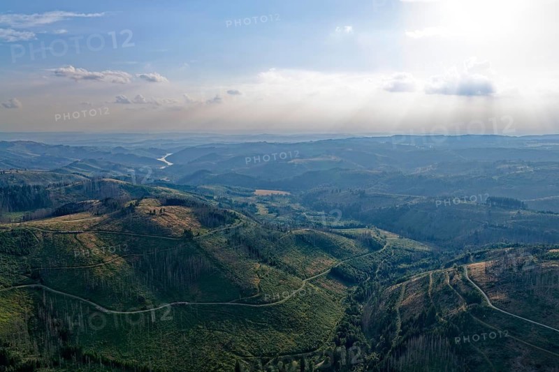 Evening mountain scenery in the Harz nature park Park, and in the Fernel the Sösestausee. aerial view. Harz, Landkreis Goslar, Lower Saxony, Germany