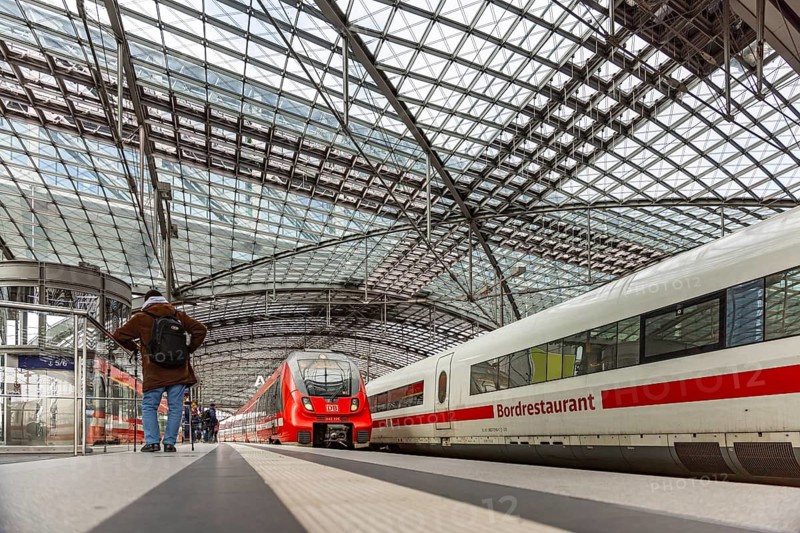 Berlin Central Station by train. Travelers on the platform. Intercity Express ICE. Berlin, Germany