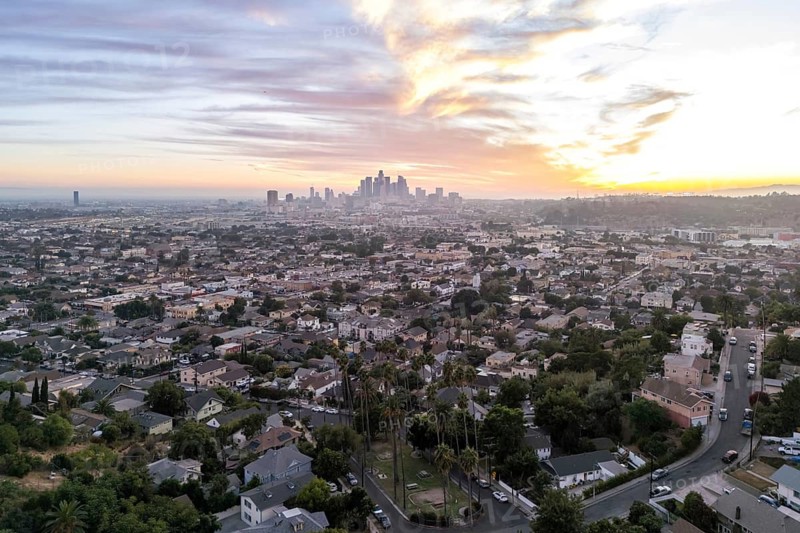 Los Angeles skyline aerial view with palm trees and downtown at sunset in California in Los Angeles, USA