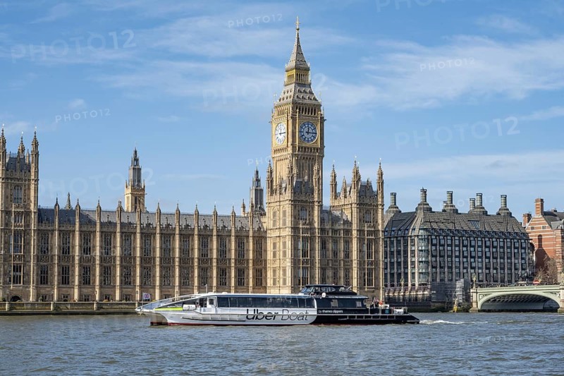 London, UK, March 17th 2026. An Uber River Taxi operated by Thames Clippers passes the Houses of Parliament or Palace of Westminster the seat of the British Government along the River Thames in the English capital London, UK