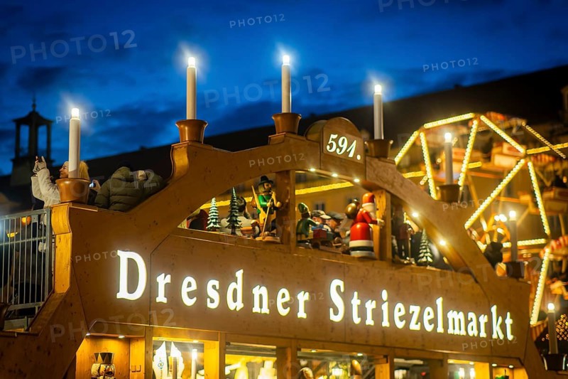Dresden's Striezelmarkt has been held in Advent since 1434, usually on the Altmarkt square, and attracts an average of around two million visitors every year. It is the oldest certified Christmas market in Germany. The European Excellent Christmas Market Association (EECMA) has recognised the Dresden Striezelmarkt 2025 as an Excellent European Christmas Market. Walk-in candle arch, Dresden, Saxony, Germany