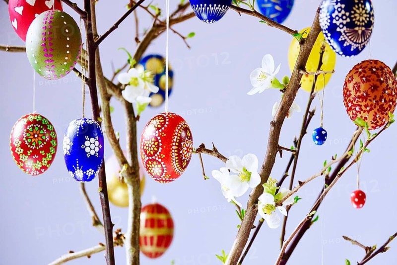 Easter, Easter bouquet with colorful Easter eggs, branches with flowers of an ornamental quince, spring, Germany
