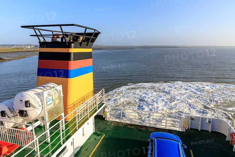 Departure of the ferry Frisia II from the harbour of Norderney, Lower Saxony, Germany