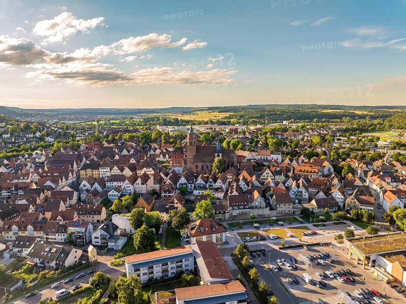 Aerial view of the city centre with dense buildings, churches and streets in a hilly landscape, Weil der Stadt, Germany