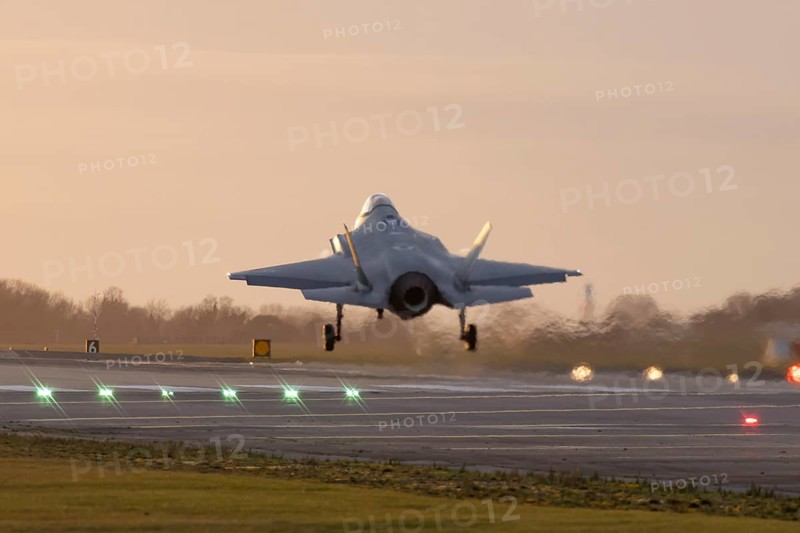 Lockheed Martin F-35 Lightning II military jet aircraft of the United States air force USAF flying on approach to land at RAF Lakenheath air base, Suffolk, England, United Kingdom