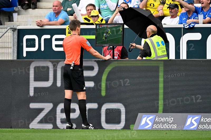 Referee Daniel Siebert in the review zone VAR, video assistant, video evidence, video referee video assistant referee soccer Bundesliga, PreZero Arena, Sinsheim, Baden-Württemberg, Germany