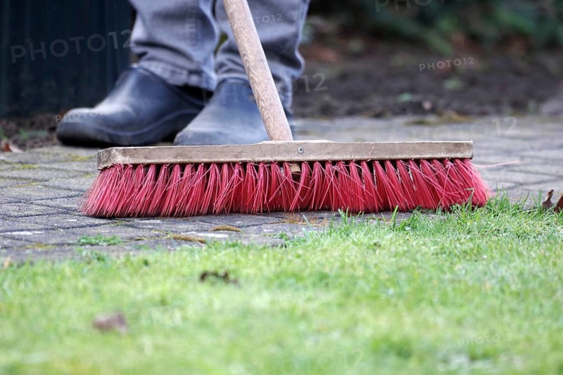 Broom, brush, sidewalk, cleaning, a man sweeps the paving stones in the garden