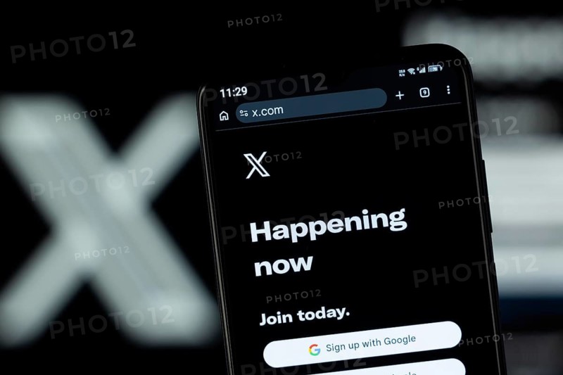 Dhaka, Bangladesh - 05 May 2026: Close-up of Twitter (X)'s homepage on a smartphone