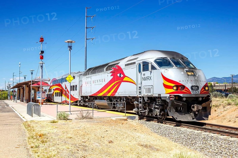 Train of the New Mexico Rail Runner Express regional railway at Zia Road station in Santa Fe, USA
