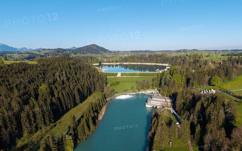 Aerial view of a river flowing through a wooded landscape with a country road, Lech barrage at Forggensee, Lech, power station, head reservoir, flood protection, flood regulation, energy generation, energy storage, Roßhaupten, Ostallgäu, Allgäu, Bavaria, Germany