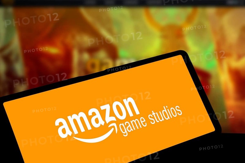 amazon game studios logo is displayed on smartphone. Amazon Games is an American video game company