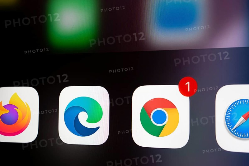 A close up of an iPhone screen displaying the Google Chrome, mozilla firefox, microsoft edge, safari app icon.