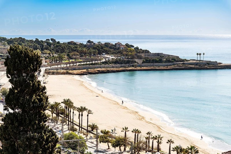 View of the bay and the city beach from the viewpoint at the end of the Rambla Nova, the Balcón Mediterráneo, balcony overlooking the Mediterranean Sea in Tarragona, Spain