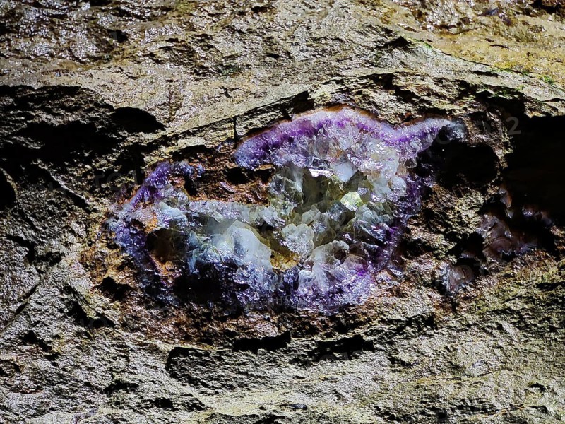 Minerals in the rock of the visitor gallery of the Steinkaulenberg gemstone mines, show mine in Idar-Oberstein, Rheinpland-Pfalz, Germany