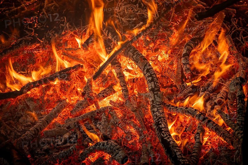 Fiery embers with blazing flames and burnt wood, fire, Finland