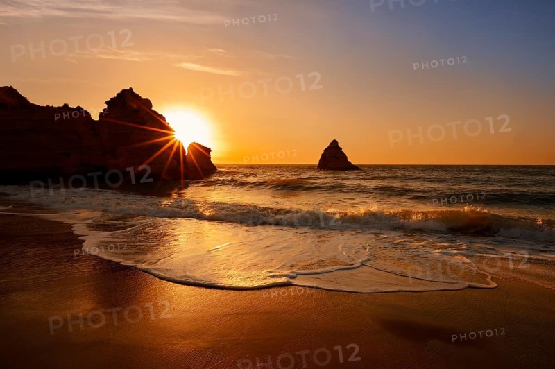 Beach and rocky coast at sunrise, Praia Dona Ana, Lagos, Algarve, Portugal