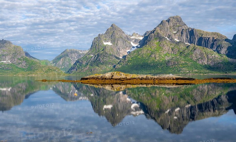 Picturesque fjord landscape at Raftsund fjord, mountains reflected in water, Vesterålen, Norway