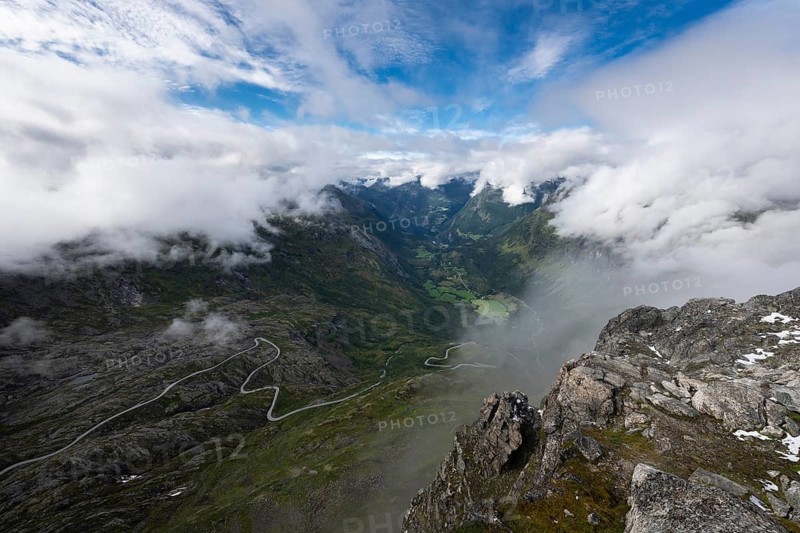 Famous curvy mountain road Fylkesvei 63 or Geirangervegen, which leads from Geiranger to the Djupvasshytta plateau, view of the Geiranger fjord from the 1476 meter high mountain peak and viewpoint Dalsnibba, Stranda, Møre og Romdal, Norway