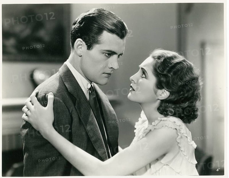 Billie Dove, Charles Starrett, film, Age for Love, Hollywood, USA, Lovers, A serious couple in elegant clothes standing close together in a room, 1931