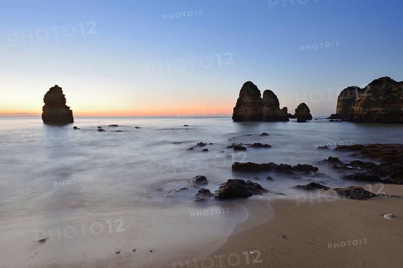 Beach and rock formations at dawn, Praia do Camilo, Lagos, Algarve, Portugal