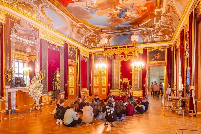 State rooms in the Dresden Royal Palace Historic ballrooms of the Dresden Royal Palace shines in new splendor after its reconstruction, almost 81 years after its destruction. Student tour in the Throne Room, Dresden, Saxony, Germany
