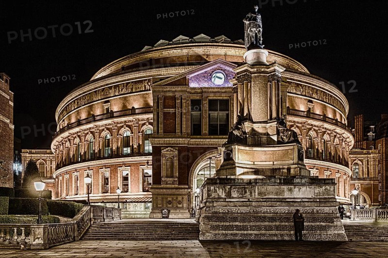 Statue of Prince Albert outside the Royal Albert Hall illuminated at night, Kensington, London, United Kingdom