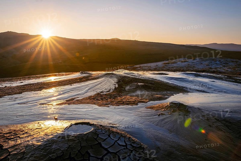 Mud volcanoes with stunning sunrise in Chahuna managed reserve in Georgia. Unique places in caucasus.Georgia