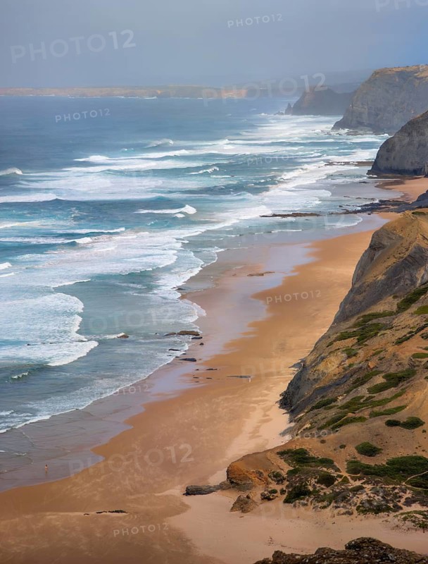 Castelejo Viewpoint in Vila do Bispo, Algarve, Portugal, looking over Praia do Castelejo, Atlantic ocean, cliffs, beach, and surf lines