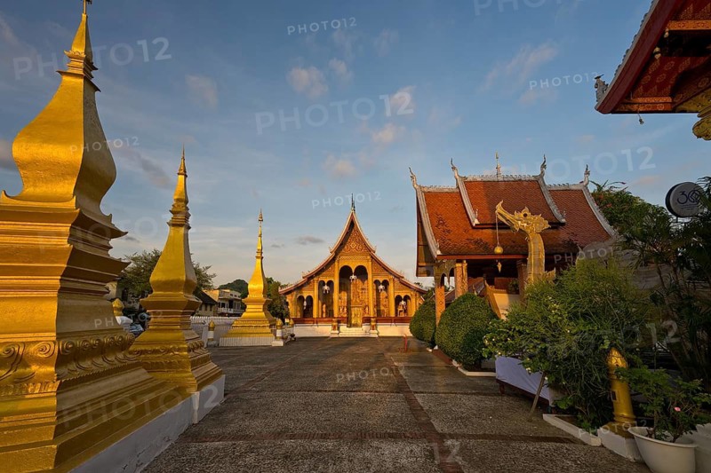 Sunrise, morning atmosphere at Wat Sibounheuang Buddhist monastery, Luang Prabang, Laos, Southeast Asia