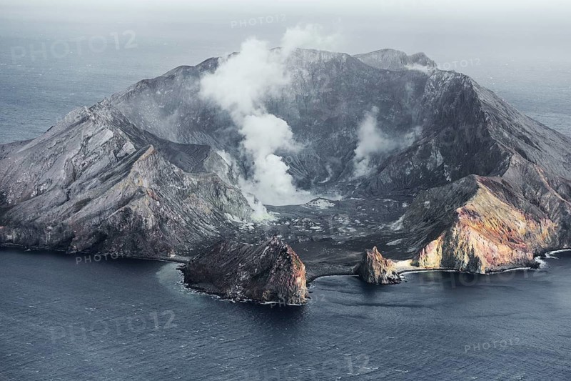 Aerial view of the steaming volcanic crater of Whakaari, White Island, New Zealand