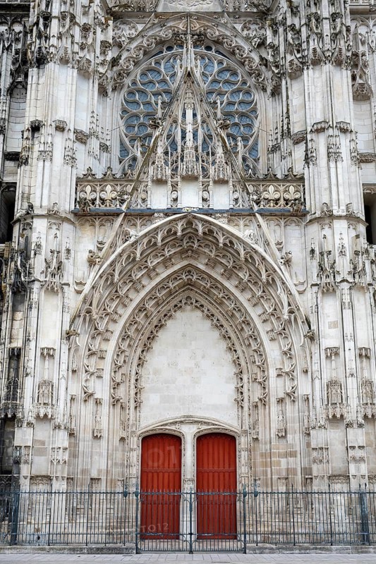 Detailed view of the magnificent side portal of Saint-Pierre-et-Saint-Paul de Troyes Cathedral in late Gothic style with richly decorated reliefs, pointed arches and a monumental church portal made of light sandstone, Troyes, Aube department, Grand Est region, France