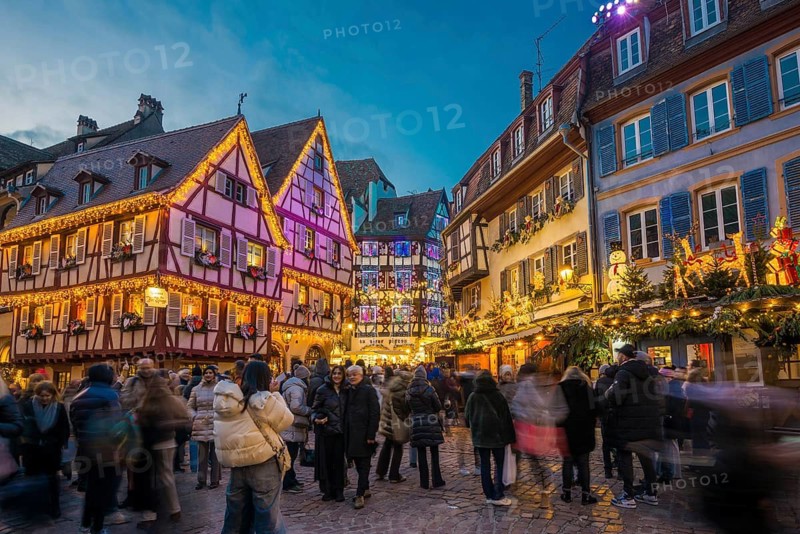 Colourfully illuminated and Christmassy decorated half-timbered houses, old town, blue hour, Colmar, Haut-Rhin department, Alsace, France