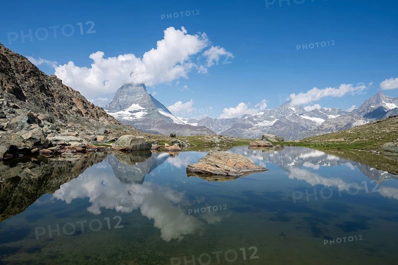 Matterhorn reflected in Riffelsee, Zermatt, Valais, Switzerland