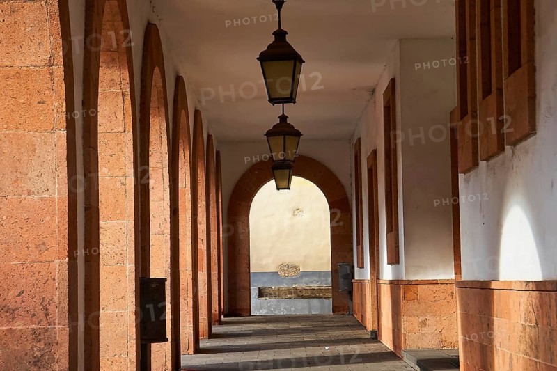 Pergola with red arcades and old lanterns, historic atmosphere with quiet shadows, UNESCO World Heritage Site, old town of San Cristobal de La Laguna, La Laguna, Tenerife, Canary Islands, Spain